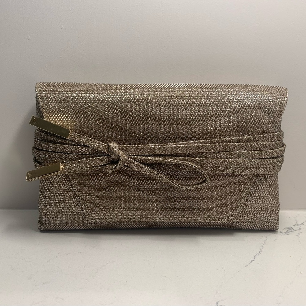 NWT Stuart Weitzman Petite Blacktie Wraparound Platinum Clutch/purse